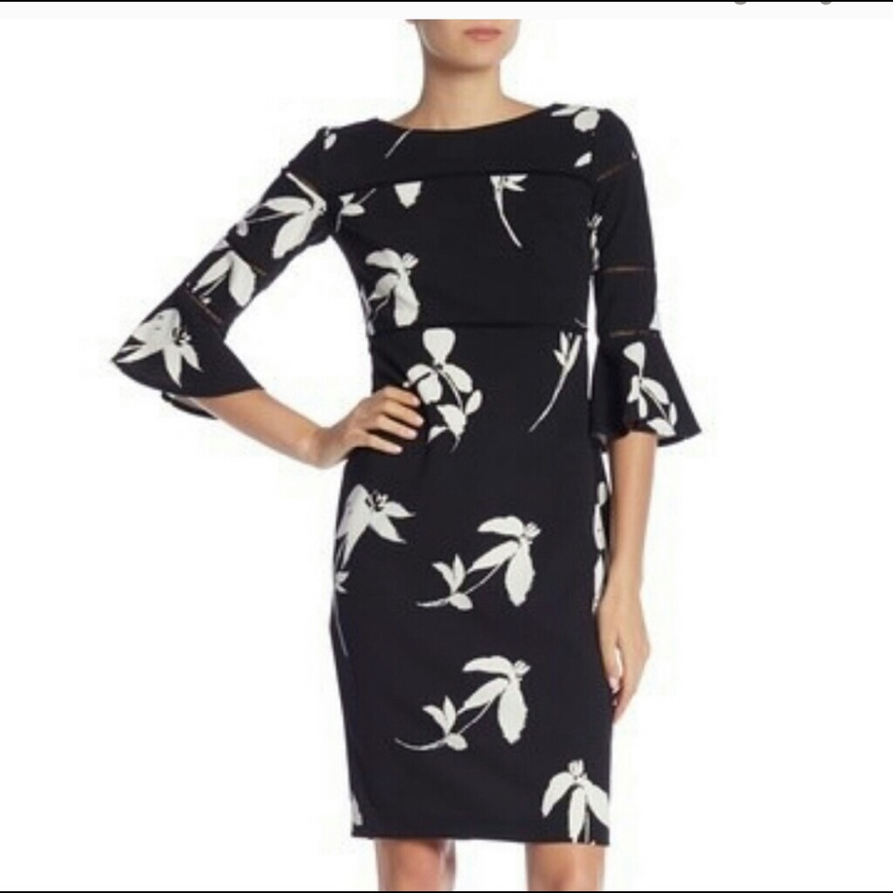 Classic black and white dress with bell sleeves